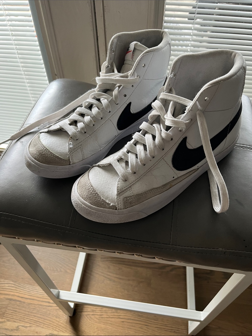 Nike Men’s White High-Top Sneakers with Black Swoosh Accent